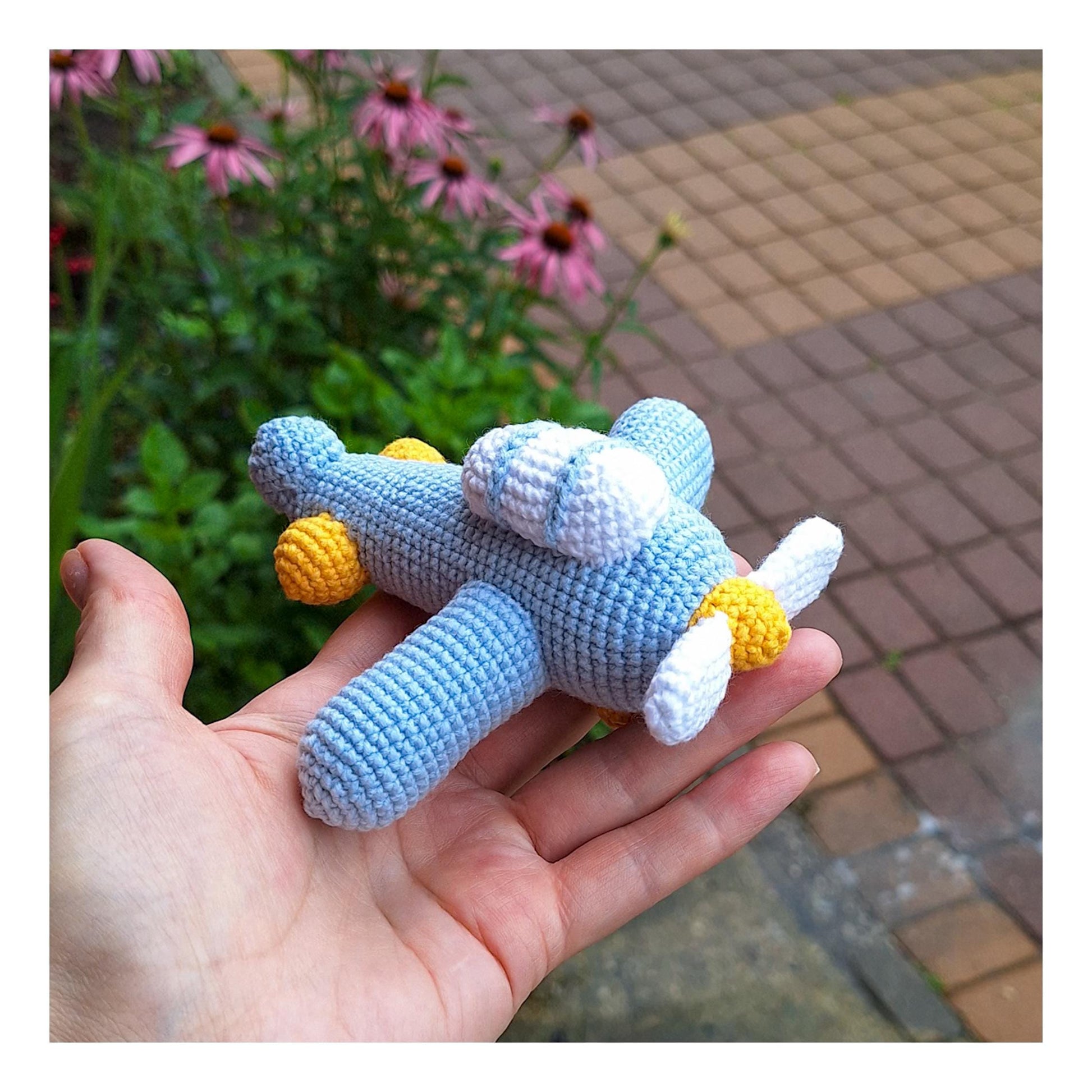 Cute blue airplane keychain with crochet details
