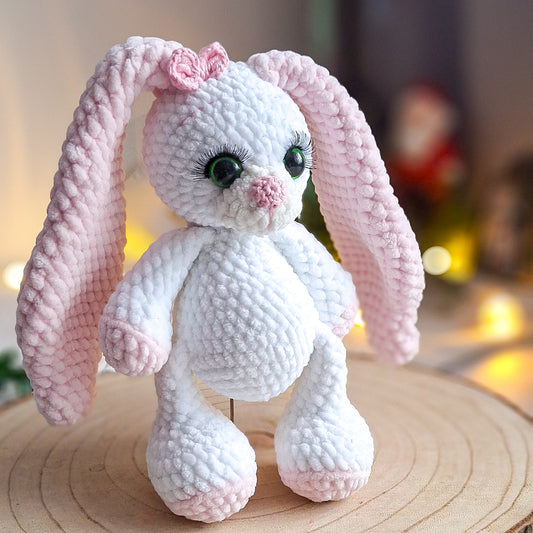 Handmade crochet bunny with long ears made from soft plush yarn